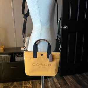 Coach Yellow canvas crossbody tote with Black Straps